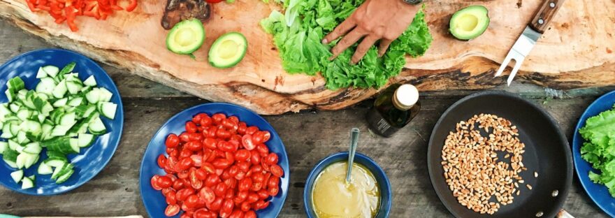 person holding sliced vegetable